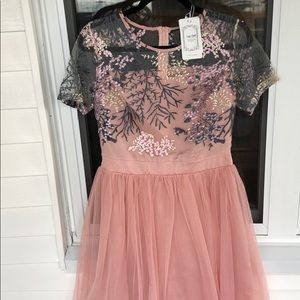 Very pretty pink dress. Tags still on